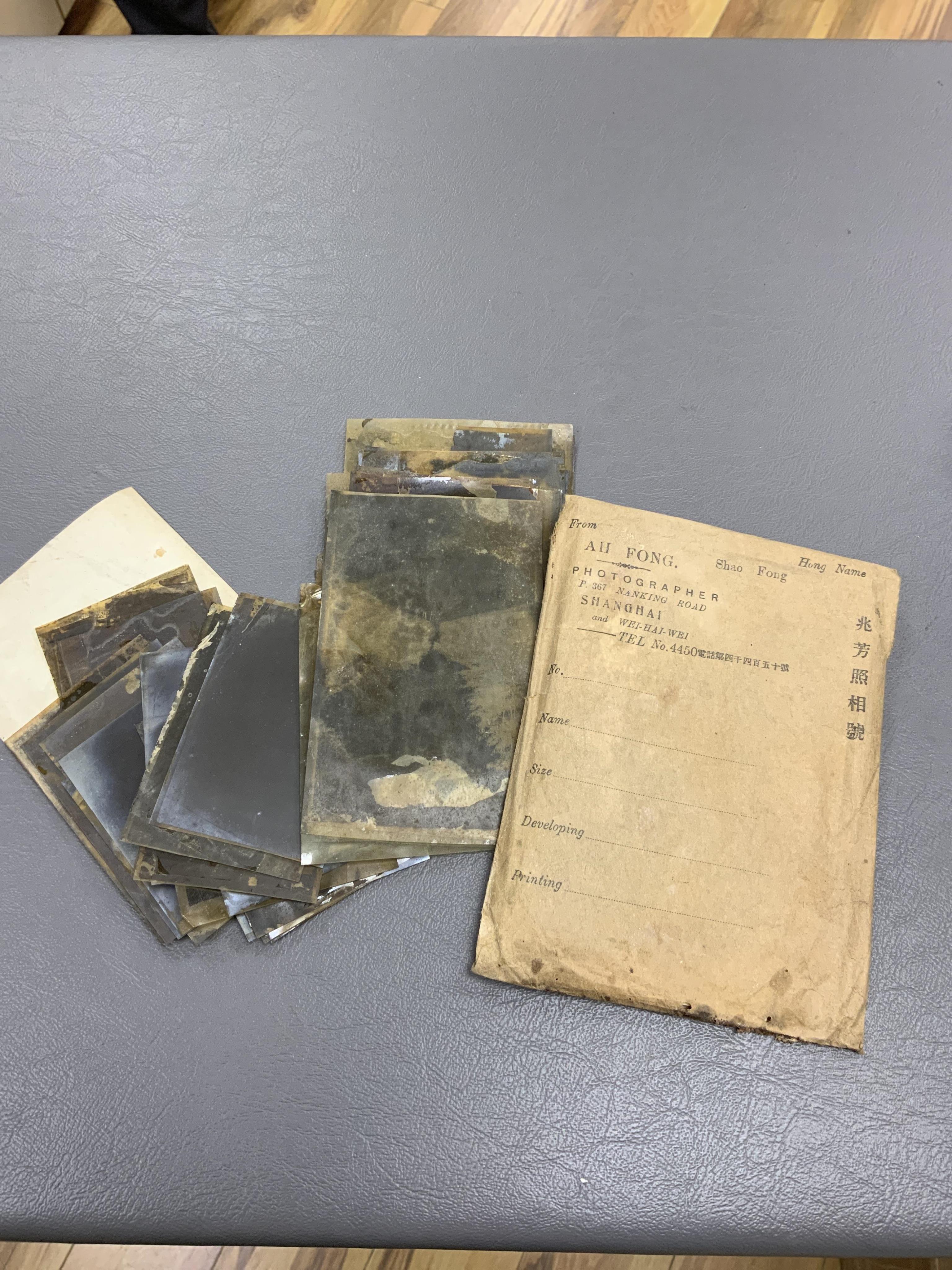 An early 20th century photograph and postcard album of Chinese and Japanese scenes, together with some negatives, etc.